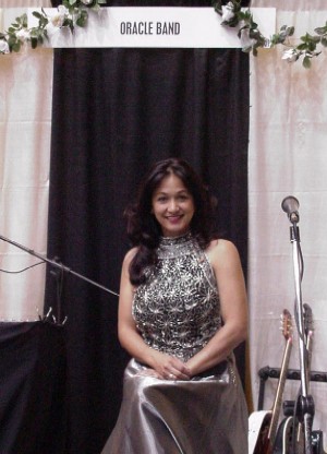 Click for enlarged view. Veronica sitting at the Oracle Booth at the Patriot Center Bridal Show