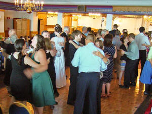The dance floor is full, even at an afternoon wedding when Oracle is playing
