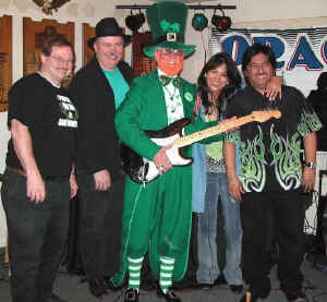The band poses with the Legion's resident leprechaun. Click for enlarged view