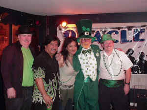 The band poses with the Legion's resident Leprechaun.  Click for enlarged view.