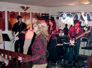 Click for enlarged view. Oracle on stage at American Legion Severna Park