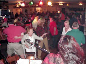 Click for enlarged view. Folks of all ages come out to dance to the sounds of Oracle Band