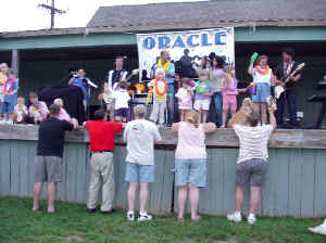 Click for enlarged view. Kids on stage at Laurel Concert
