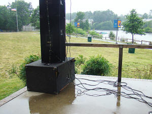 The heavens open on the band prior to the start of the concert in Laurel Maryland