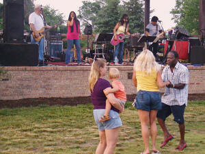 Dancers down in front of the stage at the 2008 Laurel Lakes Parks concert