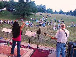 Looking out into the field at Laurel Lakes where the audience numbers grew steadily all evening long