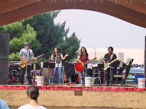 Oracle Band on stage at Laurel Independence Day concert at Laurel Lakes Maryland