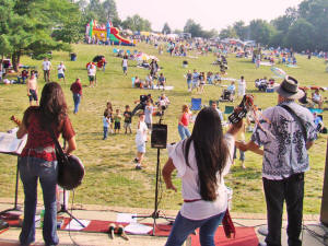 View from stage as the field continues to fill with spectators