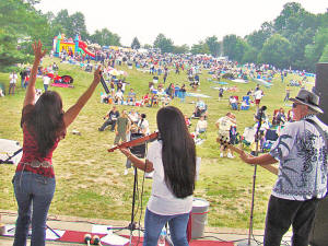 Veronne, Nikki, & Charlie look out on the audience