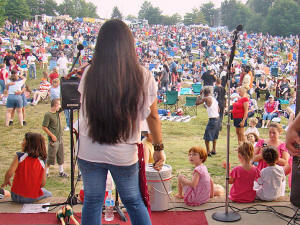 Nikki looks out at the ever swelling crowd at the Oracle  Band's performance at Laurel Lakes 2008