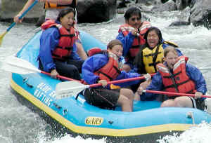 Mike, Veronne, & their daughter Nikki (on the right) take on some of Oregon's whitewater. Click for enlarged view