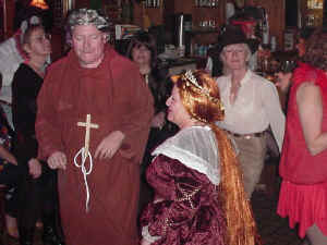 Her Majesty & her Friar, among the many wonderful costumes we saw. Click for enlarged view