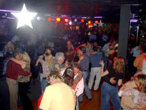 The new dance floor at Whispers is always busy when Oracle comes to perform. Click for enlarged view.