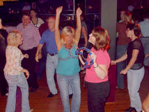 Party people on the dance floor at Whispers Restaurant in Glen Burnie Maryland