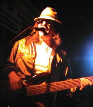 Jim Young on bass, in another lifetime! Click for enlarges view.