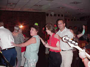 The conga line is truckin all over the room at the Fleet Reseve Club. Click for enlarged view.
