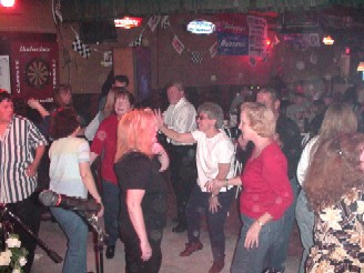 Click for enlarged view.  The Changing focus folks and many others help make a night at Jim's Hideaway a major party