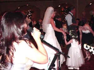 The bride dances with her flower girl. Great moments at a wedding. Click for enlarged view